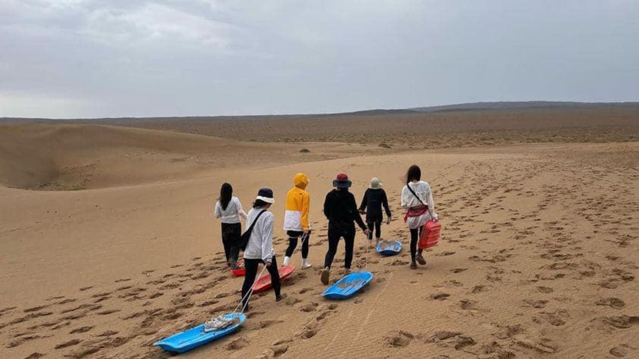 Sand sledging on the Khongor dunes
